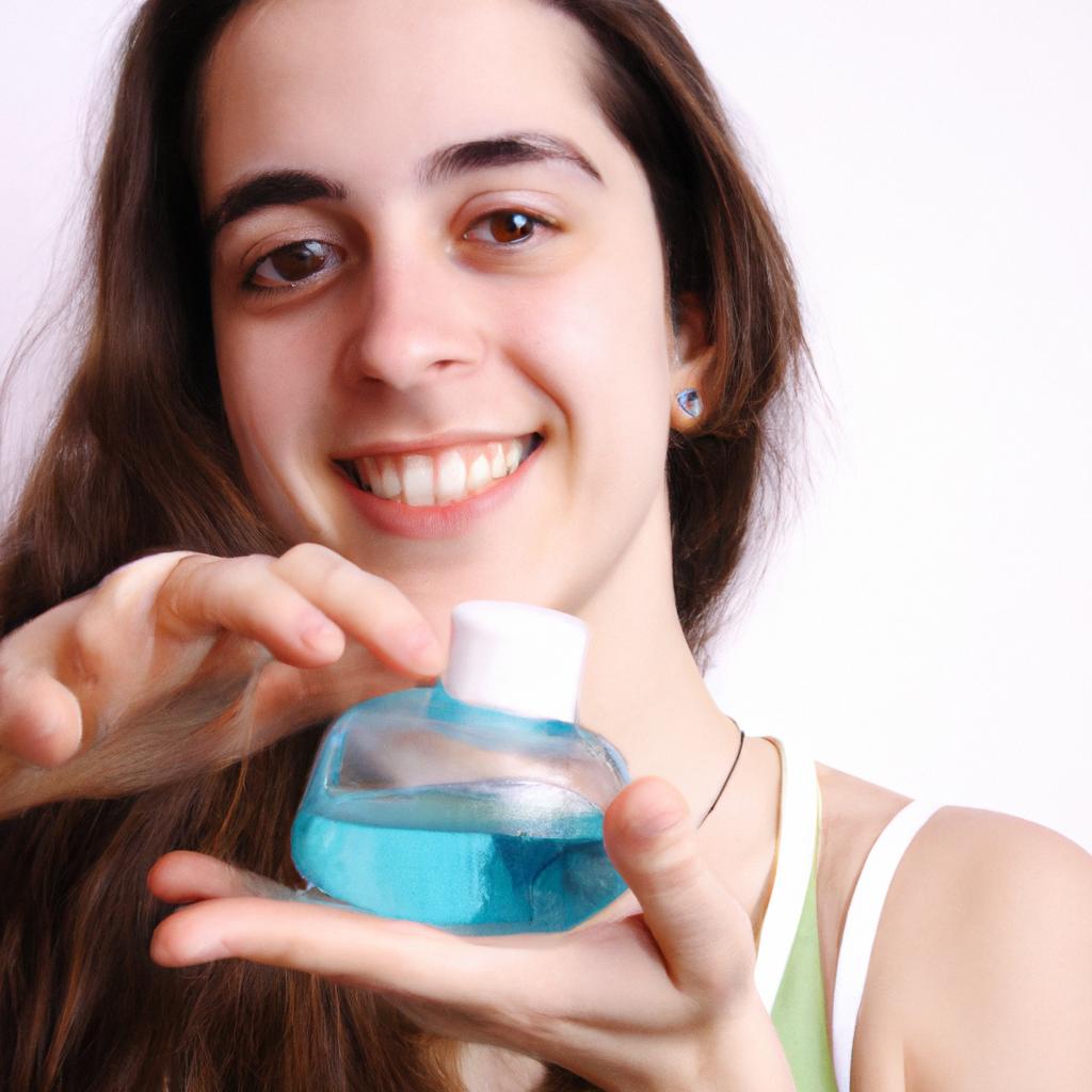Person applying skincare product, smiling