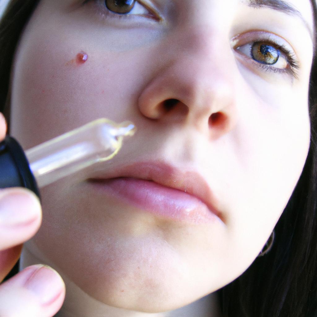 Person applying serum on face
